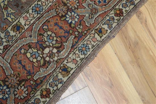 A Persian indigo ground carpet 330 x 230cm approx.